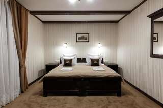 Отель GasthauS Буковель Стандартный двухместный номер с 1 кроватью или 2 отдельными кроватями-1